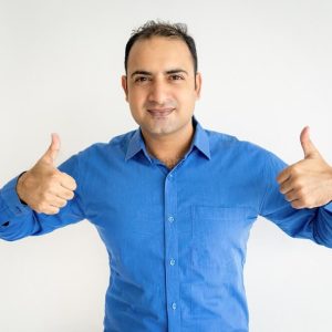 portrait-successful-mid-adult-businessman-showing-thumbs-up (1)